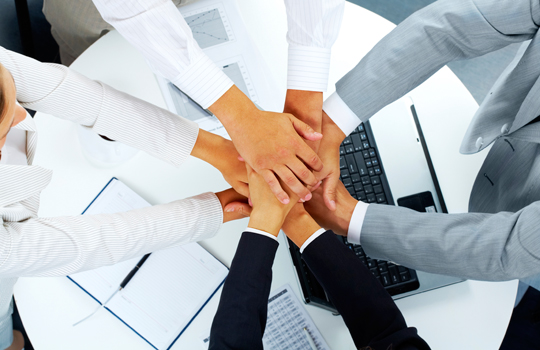 istockphoto_thinkstock_team_hands_1