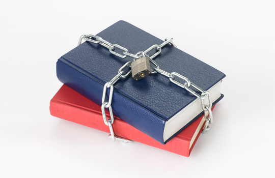 jupiterimages_comstock_thinkstock_rules_chained_books