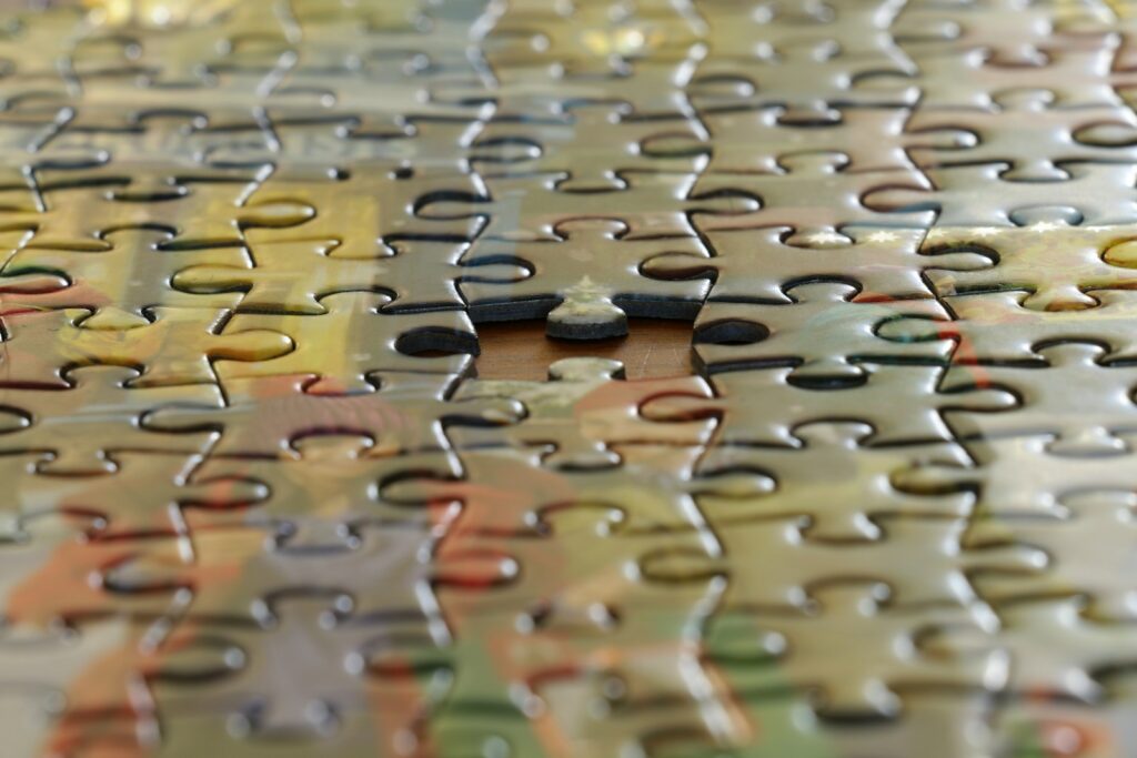 a close up view of a puzzle piece: Reckoning with repair: Learning through DEI training