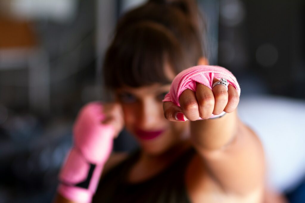 focus photography of woman's fist: optimising your LinkedIn profile