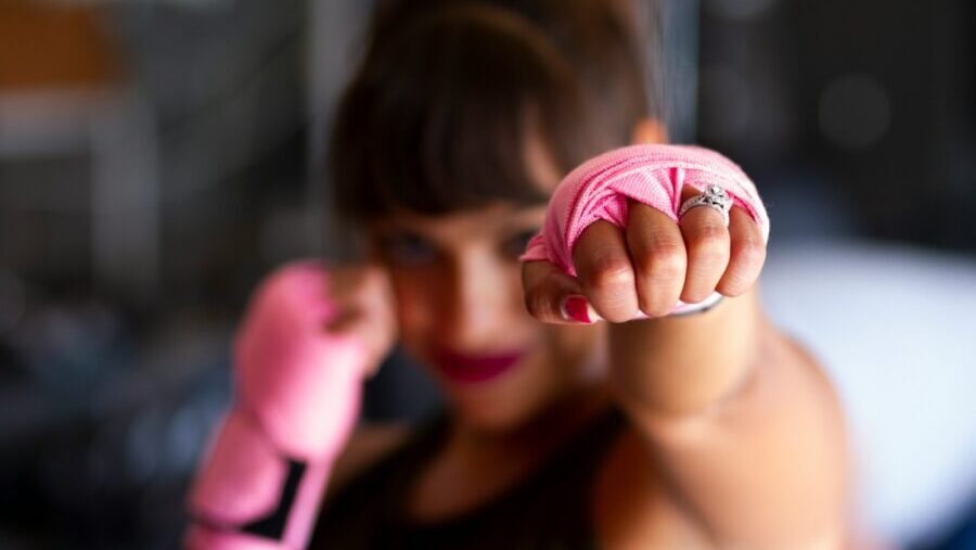 focus photography of woman's fist: optimising your LinkedIn profile
