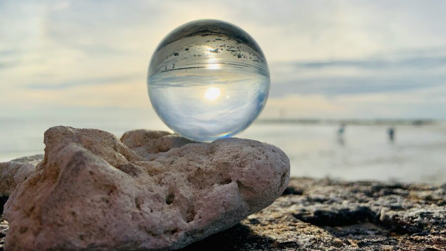 clear glass ball on brown rock expert predictions in learning and development