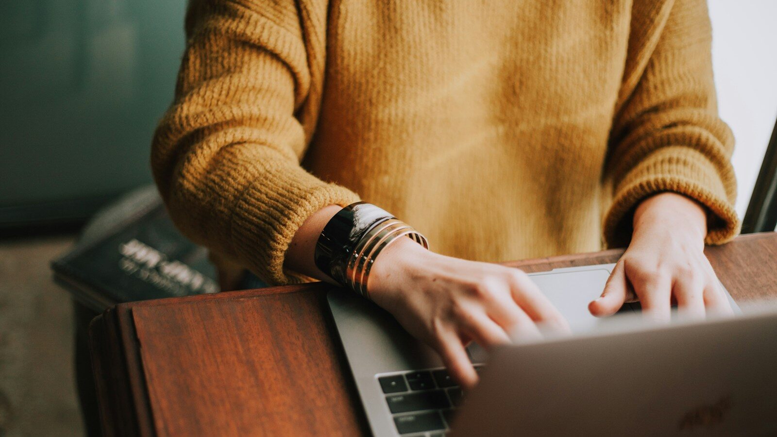 person using laptop computer, copyright