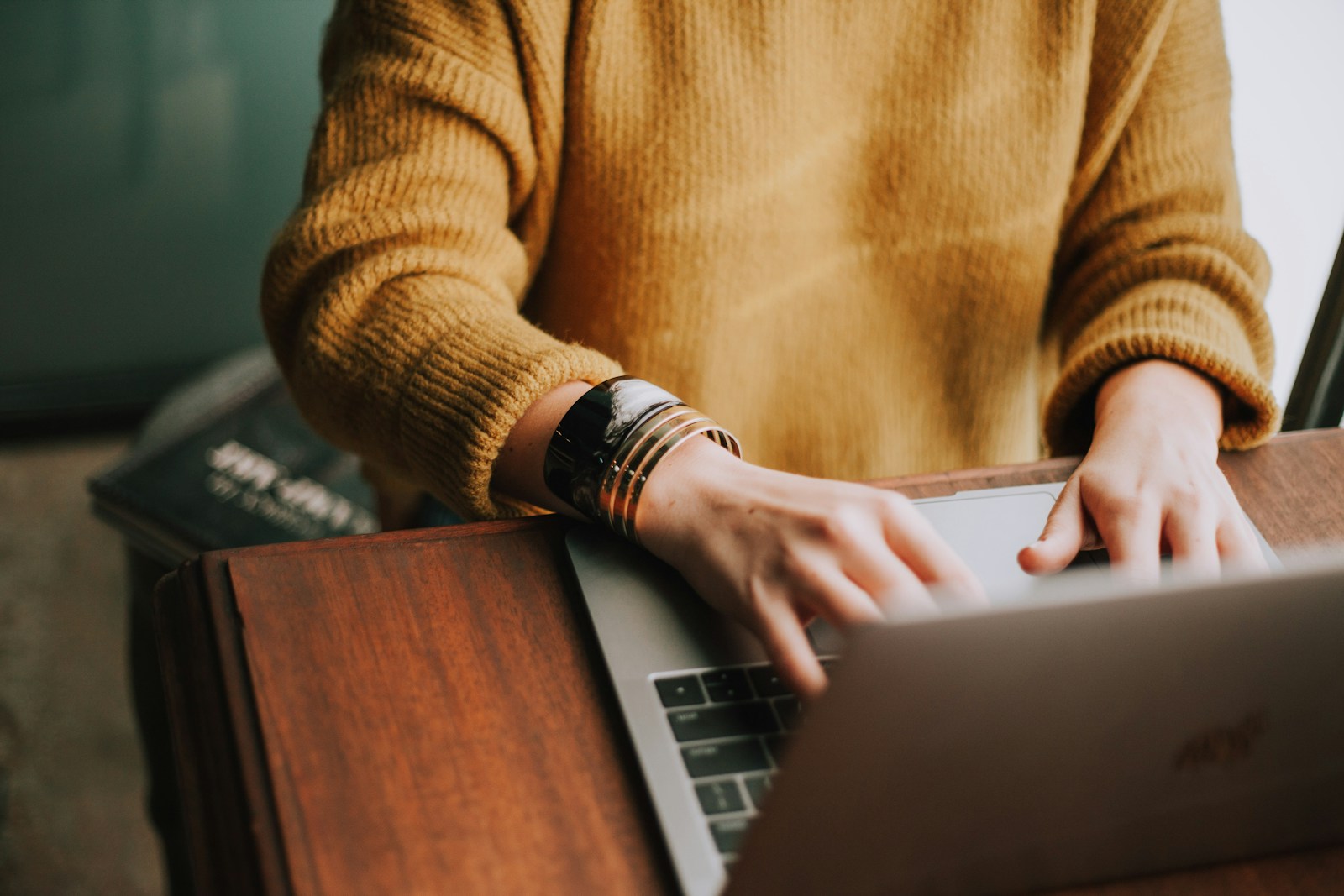 person using laptop computer, copyright