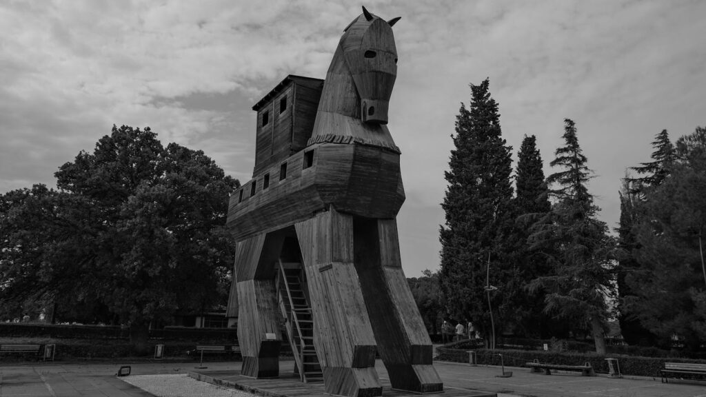 Black and white image of the famous Trojan Horse replica in Çanakkale, Türkiye. Trojan Horse or training request?