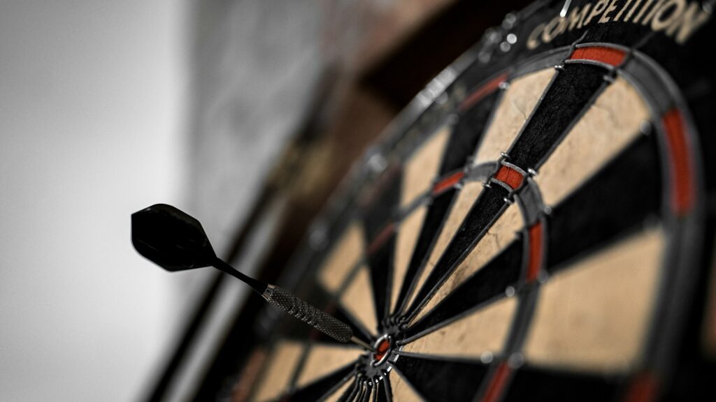 black and brown dart board