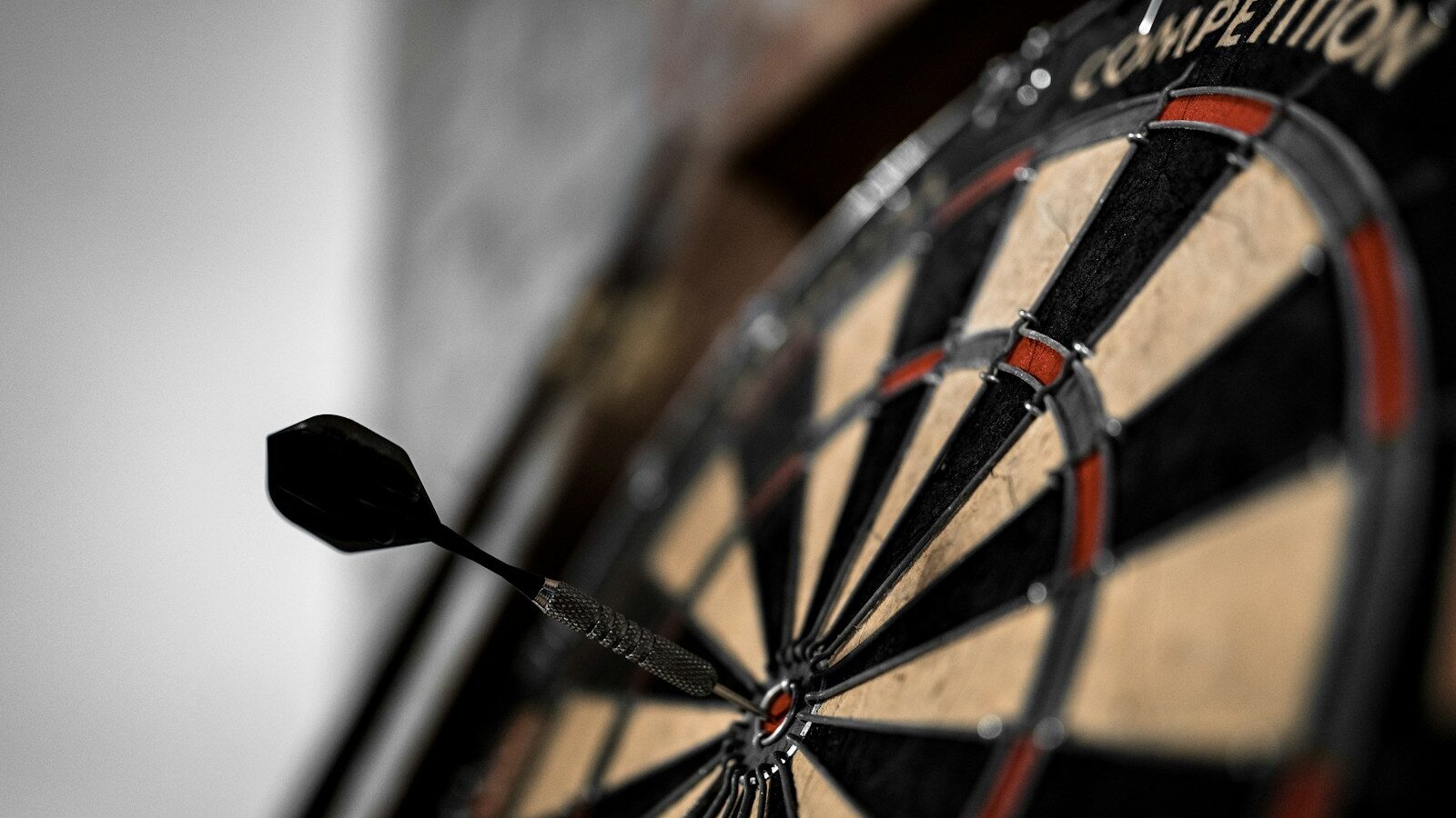 black and brown dart board